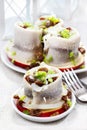 Pickled herring rolls with vegetables Royalty Free Stock Photo