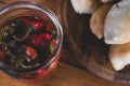 Pickled hot pepper in a glass jar Royalty Free Stock Photo