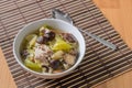 Pickled lettuce soup with shiitake mushroom and pork