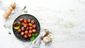 Pickled peppers stuffed with capers. Italian traditional dish. Top view. Royalty Free Stock Photo