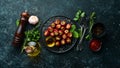 Pickled peppers stuffed with capers. Italian traditional dish. Top view. Royalty Free Stock Photo