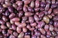Pickled purple kalamata olives as a background, closeup Royalty Free Stock Photo