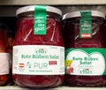 Pickled red beetroot salad jars on store shelf with vegan label Royalty Free Stock Photo