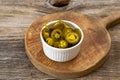 Pickled sliced green jalapeno peppers in white bowl. Close up Royalty Free Stock Photo