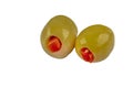 Pickled small green olives, filled with red sweet pepper in a wooden bowl. Fruits of Olea europaea, stuffed with bell pepper Royalty Free Stock Photo