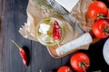 pickled soft cheese, bread and tomatoes Royalty Free Stock Photo