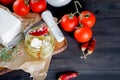 pickled soft cheese, bread and tomatoes Royalty Free Stock Photo