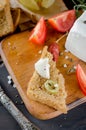 pickled soft cheese, bread and tomatoes Royalty Free Stock Photo