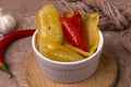 Pickled sweet Bulgarian red and yellow peppers