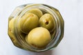 Pickled Unripe Green Almond Pickles in Glass Bottle Jar / Cagla Badem. Royalty Free Stock Photo