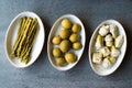 Pickled Vegetables Green Asparagus, Artichoke Heart and Unripe Green Almond Pickles in Plate. Royalty Free Stock Photo