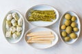 Pickled Vegetables Green and White Asparagus, Artichoke Heart and Unripe Green Almond Pickles in Plate. Royalty Free Stock Photo