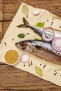 Pickled whole mackerel. Traditional Norwegian spicy salting fish