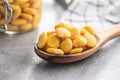 Pickled yellow Lupin Beans in wooden spoon Royalty Free Stock Photo