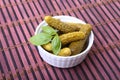 Pickles. Bowl of pickled gherkins cucumber with copy space. Cornichons. Royalty Free Stock Photo