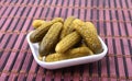 Pickles. Bowl of pickled gherkins cucumber with copy space. Cornichons. Royalty Free Stock Photo