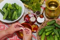 Pickling cucumbers, pickling - hands close-up, cucumber, herbs,