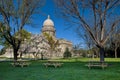 Picknick tables on the grass at the Capital Royalty Free Stock Photo