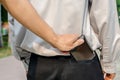 Pickpocket stealing a mans wallet from back pocket Royalty Free Stock Photo