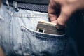 Pickpocket stealing wallet from back jean pocket Royalty Free Stock Photo