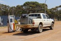 Retro pickup car refuels at a vintage Shell gas station, Australia