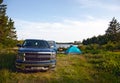 A pickup truck on a campsite Royalty Free Stock Photo