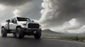 A pickup truck is driving down the road. Dark dramatic landscape as background, gloomy sky with rainy clouds, forest and hill. Royalty Free Stock Photo