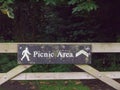 Picnic area public sign on wooden fence countryside up close
