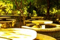 Picnic area with a table and a bench in the forest by the river Royalty Free Stock Photo