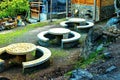 Picnic area with a table and a bench in the forest by the river Royalty Free Stock Photo