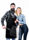 Picnic and barbecue. Culinary concept. Man bearded hipster and girl ready for barbecue party. Family weekend. Couple in Royalty Free Stock Photo