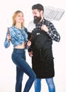 Picnic and barbecue. Man bearded hipster and girl ready for barbecue party. Culinary concept. Family weekend. Couple in Royalty Free Stock Photo