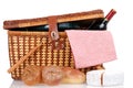 Picnic basket with bread cheese and wine Royalty Free Stock Photo