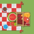 Picnic basket food red and white blanket top view Royalty Free Stock Photo