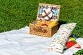 Picnic Basket Food On White Blanket With Pillows Royalty Free Stock Photo