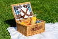 Picnic Basket Food On White Blanket Royalty Free Stock Photo