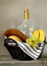 Picnic basket with fruit , bread and wine Royalty Free Stock Photo