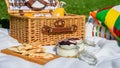 Picnic Basket With Fruits, Orange Juice, Croissants, Quesadilla And No Bake Blueberry And Strawberry Cheesecake Royalty Free Stock Photo