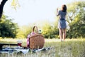 Picnic basket and girl in background