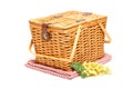 Picnic Basket, Grapes and Folded Blanket Isolated Royalty Free Stock Photo