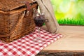 Picnic basket on the table and bottle of wine top angle Royalty Free Stock Photo