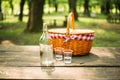 Picnic Basket on a table in the forest