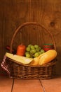 Picnic basket - wine, fruit, cheese Royalty Free Stock Photo