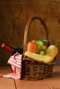 Picnic basket - wine, fruit, cheese Royalty Free Stock Photo