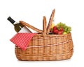 Picnic basket with wine and fruit on white Royalty Free Stock Photo