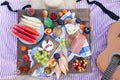 Picnic on the beach at sunset in the style boho, food and drink conception Royalty Free Stock Photo