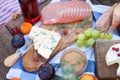 Picnic on the beach at sunset in the style boho, food and drink conception Royalty Free Stock Photo