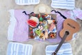 Picnic on the beach at sunset in the style boho, food and drink conception Royalty Free Stock Photo