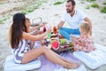 Picnic on the beach at sunset in the style boho, food and drink conception Royalty Free Stock Photo