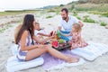 Picnic on the beach at sunset in the style boho, food and drink conception Royalty Free Stock Photo